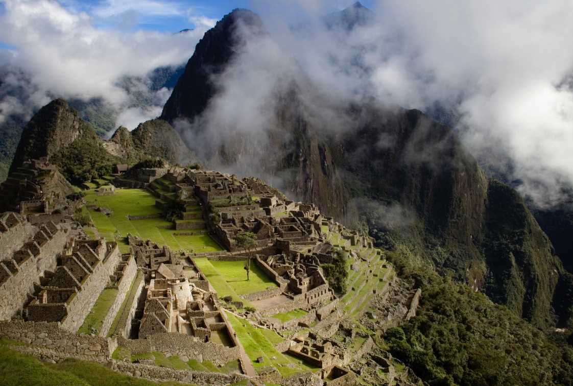 The iconic and unforgettable view of one of the 7 Wonders of the New World - the citadel of Machu Picchu.